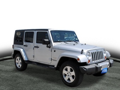 jeep wrangler unlimited 2009 silver suv sahara gasoline 6 cylinders 4 wheel drive automatic with overdrive 77037