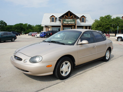 ford taurus 1999 gold sedan se gasoline v6 front wheel drive automatic 76087