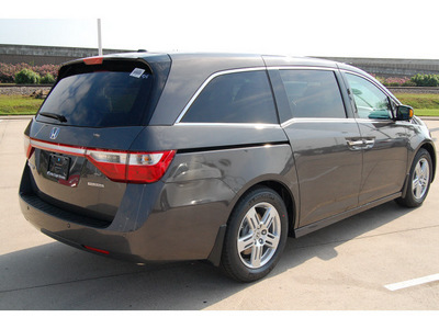 honda odyssey 2012 brown van touring elite gasoline 6 cylinders front wheel drive 6 speed automatic 77065