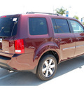 honda pilot 2012 dk  red suv touring gasoline 6 cylinders 2 wheel drive 5 speed automatic 77065
