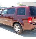 honda pilot 2012 dk  red suv touring gasoline 6 cylinders 2 wheel drive 5 speed automatic 77065