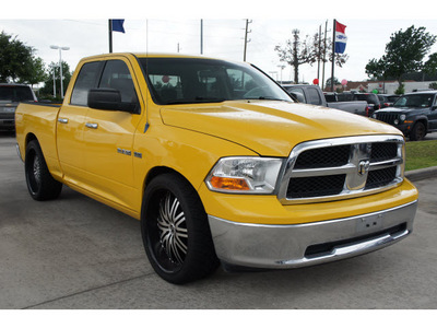dodge ram pickup 1500 2009 yellow pickup truck slt gasoline 8 cylinders 2 wheel drive automatic 77090