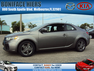 kia forte 2012 lt  gray coupe ex gasoline 4 cylinders front wheel drive 6 speed manual 32901