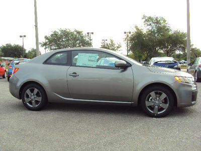 kia forte 2012 lt  gray coupe ex gasoline 4 cylinders front wheel drive 6 speed manual 32901