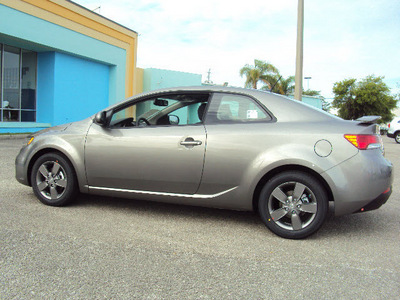 kia forte 2012 lt  gray coupe ex gasoline 4 cylinders front wheel drive 6 speed manual 32901