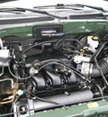 mazda tribute 2002 light cypress suv es v6 gasoline 6 cylinders 4 wheel drive automatic 80911