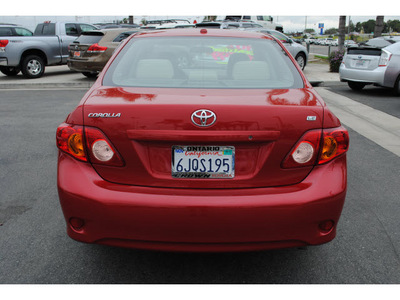 toyota corolla 2010 red sedan le gasoline 4 cylinders front wheel drive automatic 91761