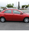 toyota corolla 2010 red sedan le gasoline 4 cylinders front wheel drive automatic 91761