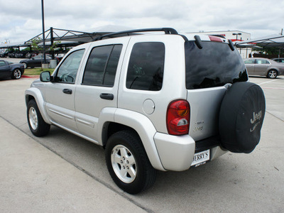jeep liberty 2004 silver suv limited gasoline 6 cylinders rear wheel drive automatic with overdrive 76087