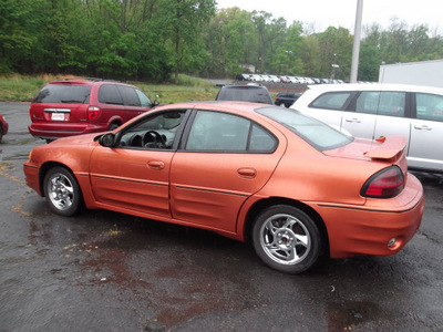 pontiac grand am 2004 orange sedan gt1 gasoline 6 cylinders front wheel drive automatic 08812