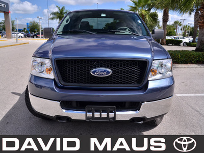 ford f 150 2005 blue xlt gasoline 8 cylinders 4 wheel drive automatic 32771