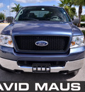 ford f 150 2005 blue xlt gasoline 8 cylinders 4 wheel drive automatic 32771