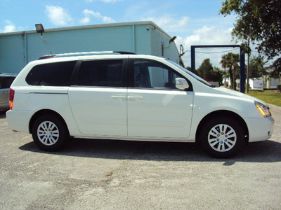 kia sedona 2012 white van lx w 3rd row seat gasoline 6 cylinders front wheel drive automatic 32901