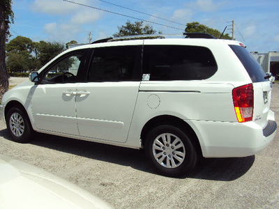 kia sedona 2012 white van lx w 3rd row seat gasoline 6 cylinders front wheel drive automatic 32901