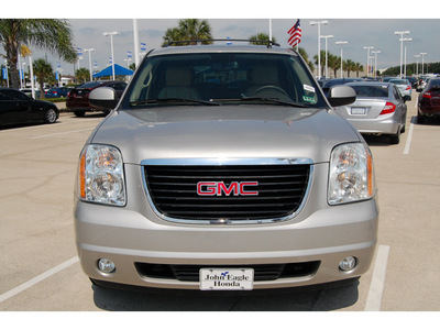 gmc yukon 2007 gold suv slt flex fuel 8 cylinders rear wheel drive automatic with overdrive 77065