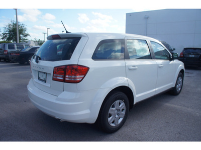 dodge journey 2012 white american value package gasoline 4 cylinders front wheel drive automatic 33157