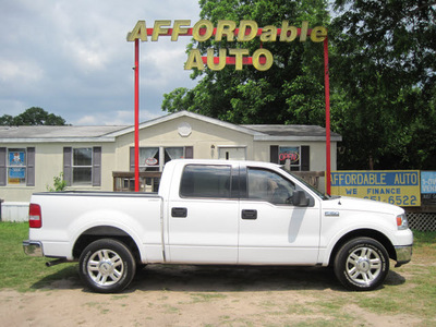 ford f 150 2004 white lariat gasoline 8 cylinders rear wheel drive automatic 77379