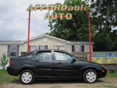 ford focus 2007 black sedan zx4 se gasoline 4 cylinders front wheel drive automatic 77379
