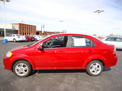 chevrolet aveo 2011 red sedan lt gasoline 4 cylinders front wheel drive automatic 60007