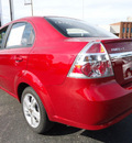 chevrolet aveo 2011 red sedan lt gasoline 4 cylinders front wheel drive automatic 60007