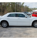 chrysler 300 2010 white sedan touring gasoline 6 cylinders rear wheel drive automatic with overdrive 77037