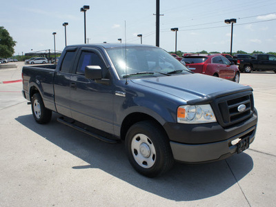 ford f 150 2006 blue xl gasoline 8 cylinders rear wheel drive automatic with overdrive 76087