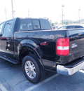 ford f 150 2005 black lariat gasoline 8 cylinders 4 wheel drive automatic with overdrive 32401