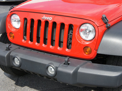 jeep wrangler unlimited 2012 red suv sport gasoline 6 cylinders 4 wheel drive automatic 33021