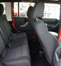 jeep wrangler unlimited 2012 red suv sport gasoline 6 cylinders 4 wheel drive automatic 33021