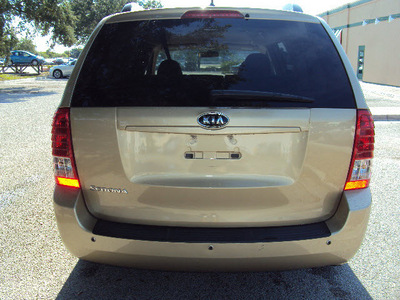 kia sedona 2011 beige van lx w 3rd row seat gasoline 6 cylinders front wheel drive automatic 32901