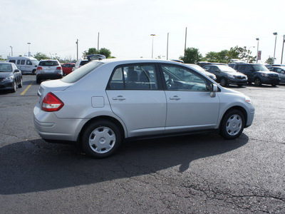 nissan versa 2010 silver sedan gasoline 4 cylinders front wheel drive automatic 19153