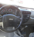 jeep wrangler 2005 black suv x gasoline 6 cylinders 4 wheel drive 6 speed manual 75503