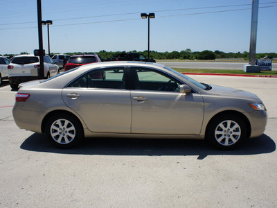 toyota camry 2009 gold sedan xle gasoline 4 cylinders front wheel drive automatic 76087