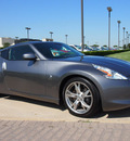 nissan 370z 2011 silver coupe gasoline 6 cylinders rear wheel drive 6 speed manual 76018