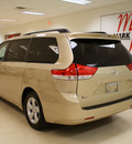 toyota sienna 2011 tan van le 8 passenger gasoline 6 cylinders front wheel drive automatic 27707