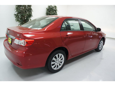 toyota corolla 2012 red sedan le gasoline 4 cylinders front wheel drive automatic 91731
