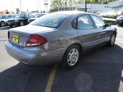 ford taurus 2006 silver frost sedan se gasoline 6 cylinders front wheel drive automatic 07724