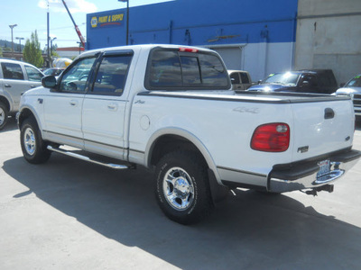 ford f 150 2001 off white lariat gasoline 8 cylinders 4 wheel drive automatic with overdrive 99212
