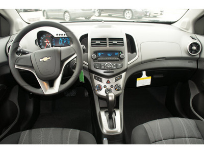 chevrolet sonic 2012 silver hatchback lt gasoline 4 cylinders front wheel drive automatic 77090