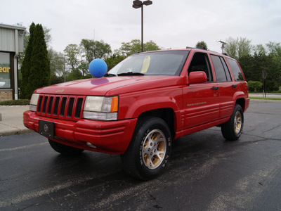 jeep grand cherokee 1996 red suv limited gasoline 8 cylinders 4 wheel drive automatic 61008