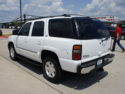 gmc yukon 2005 white suv slt gasoline 8 cylinders rear wheel drive automatic 76087