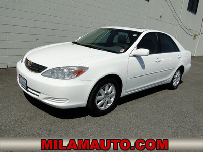 toyota camry 2002 white sedan xle v6 gasoline 6 cylinders front wheel drive automatic with overdrive 98371