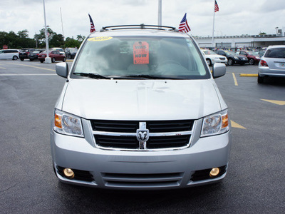 dodge grand caravan 2010 silver van sxt gasoline 6 cylinders front wheel drive automatic 33021