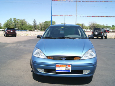 ford focus 2001 light sapphire blue sedan se gasoline 4 cylinders front wheel drive automatic 80911