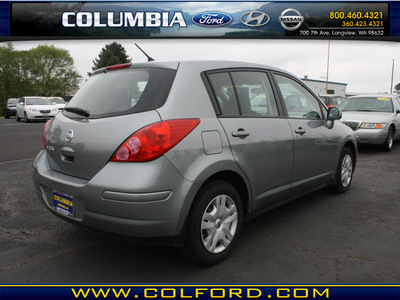 nissan versa 2011 silver hatchback 1 8 s gasoline 4 cylinders front wheel drive automatic 98632