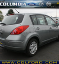 nissan versa 2011 silver hatchback 1 8 s gasoline 4 cylinders front wheel drive automatic 98632