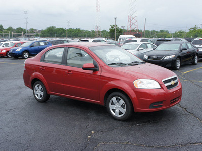 chevrolet aveo 2011 red sedan lt gasoline 4 cylinders front wheel drive automatic 19153