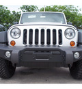 jeep wrangler unlimited 2012 silver suv rubicon gasoline 6 cylinders 4 wheel drive automatic 33157