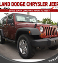 jeep wrangler unlimited 2012 red suv sport gasoline 6 cylinders 4 wheel drive automatic 33157