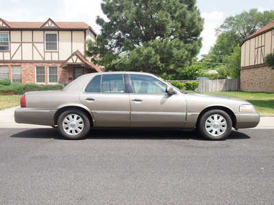 mercury grand marquis 2003 beige sedan ls limited leather gasoline 8 cylinders sohc rear wheel drive automatic 80012